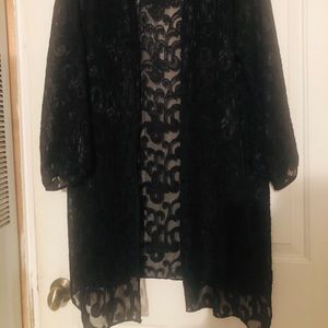 Jacket with sheer patterned fabric